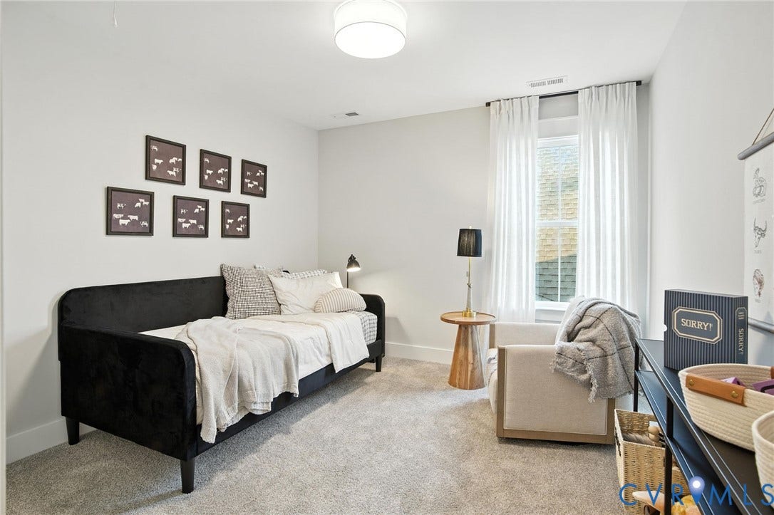 Lot 1 Needlewood Court, Olivet Church Estates, New Kent, VA 23124 Neutral wall paint, recessed lighting, window with light-filtering curtains, and soft carpet flooring