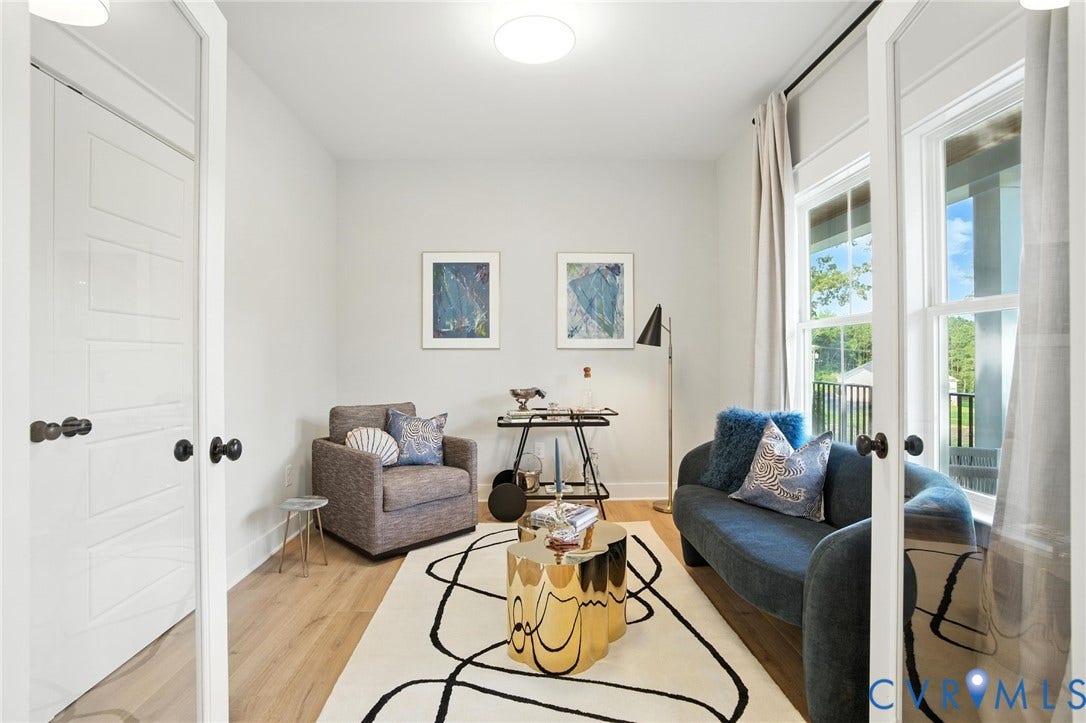 Lot 1 Needlewood Court, Olivet Church Estates, New Kent, VA 23124 Hardwood-finish flooring, white paneled double doors with black hardware, and an overhead flush-mount light fixture