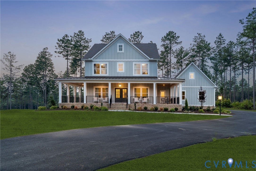 Lot 1 Needlewood Court, Olivet Church Estates, New Kent, VA 23124 Two-story residence featuring light blue siding, a covered front porch with white columns, and a paved driveway