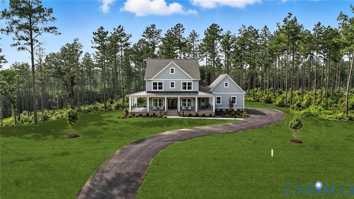 Lot 1 Needlewood Court, Olivet Church Estates, New Kent, VA 23124 Traditional-style residence featuring light gray siding, a covered wraparound porch with white columns, and dark-framed windows