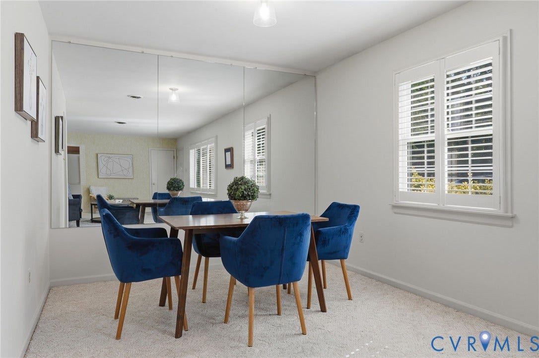4810 Conduit Road, Colonial Heights, VA 23834 Full-wall mirror installation, white interior paint, white plantation shutters, and light-toned carpeting