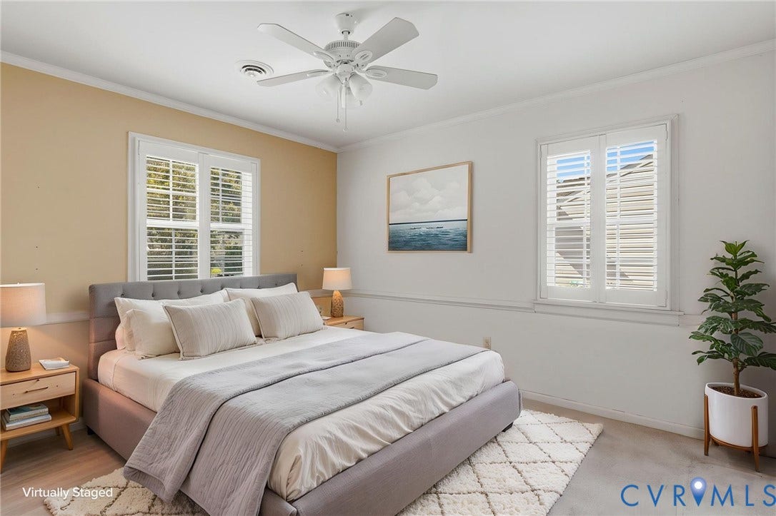 4810 Conduit Road, Colonial Heights, VA 23834 Wood-finish flooring, white plantation shutters, two-tone wall paint, crown molding, and a ceiling fan with light fixture