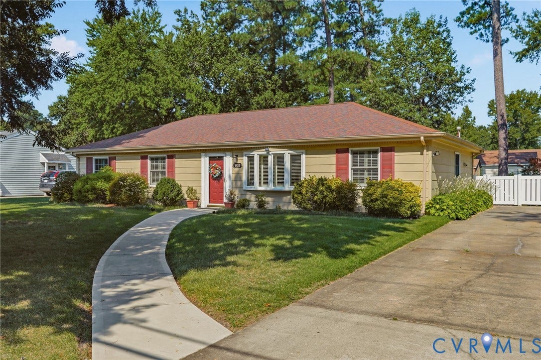 4810 Conduit Road, Colonial Heights, VA 23834 Siding exterior with red shutters, red entry door, and a bay window