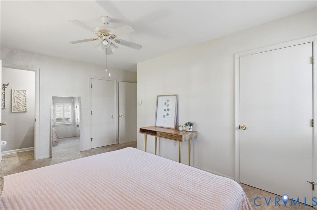 4810 Conduit Road, Colonial Heights, VA 23834 Neutral wall color, ceiling fan with light kit, carpeted flooring, and white interior doors