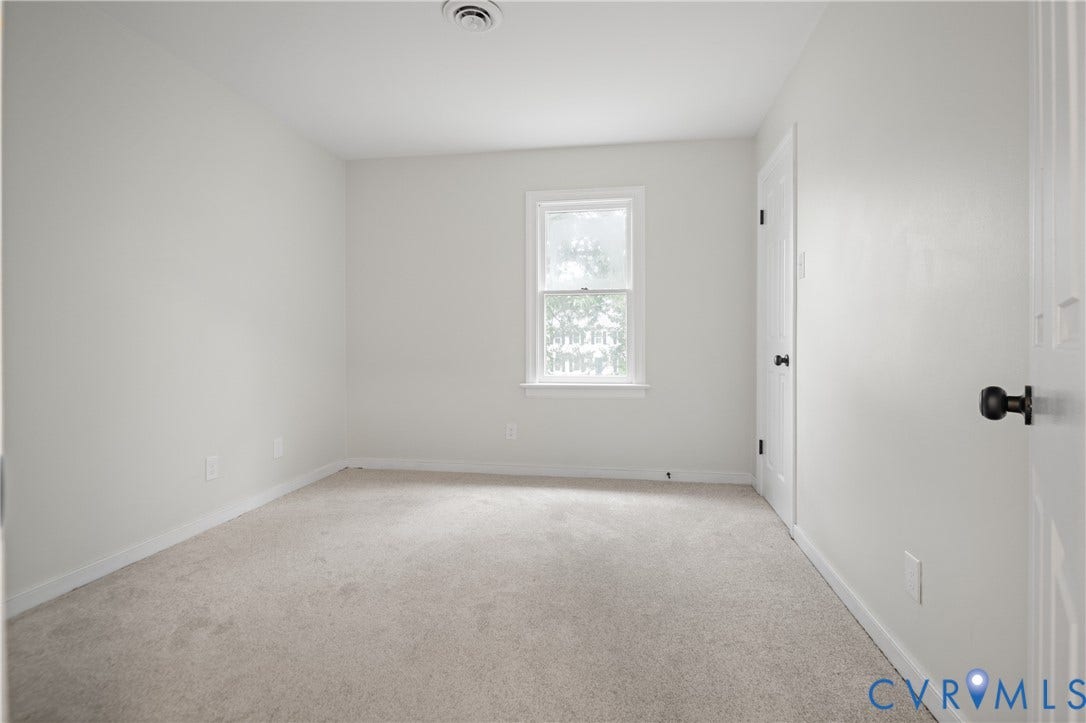 4525 Old Mesa Drive, North Chesterfield, VA 23237 Neutral-toned carpeting complements light-colored walls