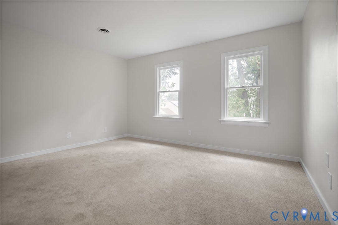 4525 Old Mesa Drive, North Chesterfield, VA 23237 Carpeted flooring, white walls, and two double-hung windows with white trim
