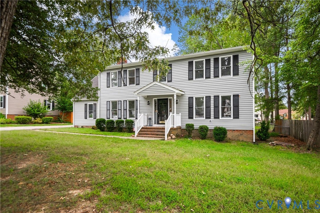 4525 Old Mesa Drive, North Chesterfield, VA 23237 Two-story exterior with light gray siding and dark shutters