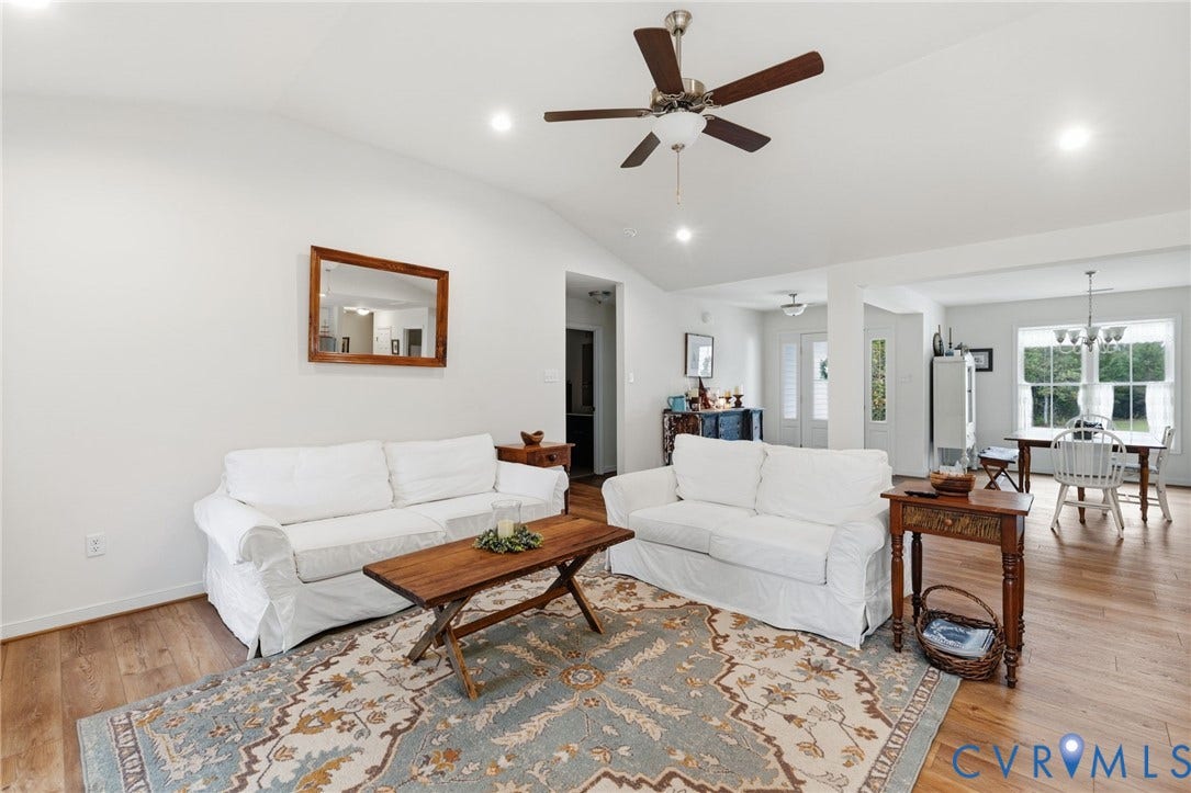 2927 Poorhouse Road, 522 Corridor, Goochland, VA 23063 Vaulted ceiling, recessed lighting, LVP flooring, ceiling fan, and white painted walls