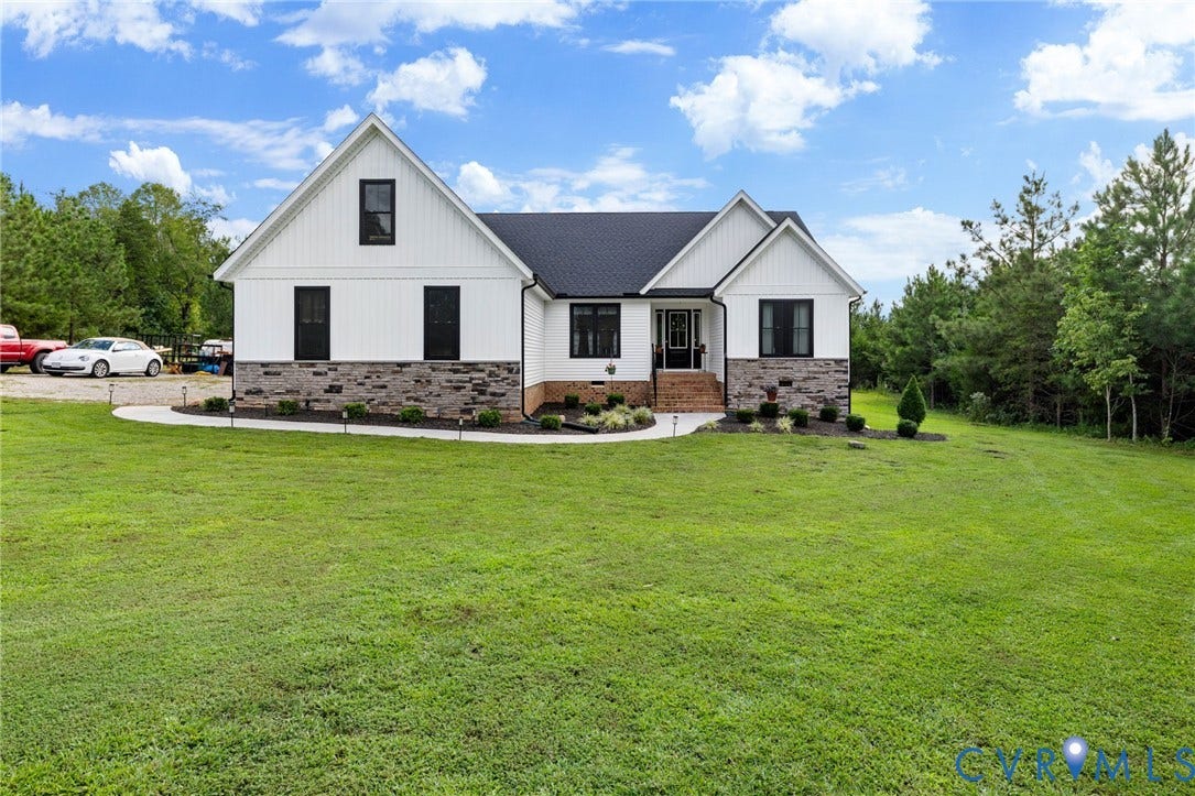 2927 Poorhouse Road, 522 Corridor, Goochland, VA 23063 Modern farmhouse exterior with white board and batten siding, dark shingle roof, and stone accents