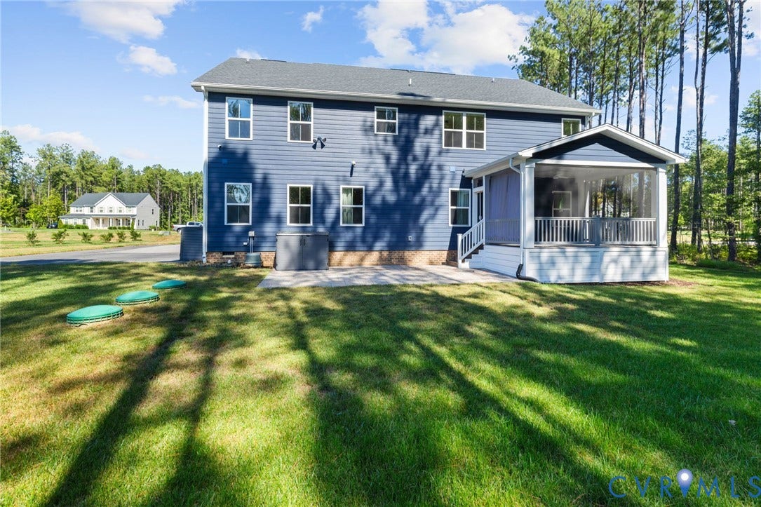 8618 McKibben Drive, The Highlands, Chesterfield, VA 23838 Blue siding exterior with a screened porch and white railings