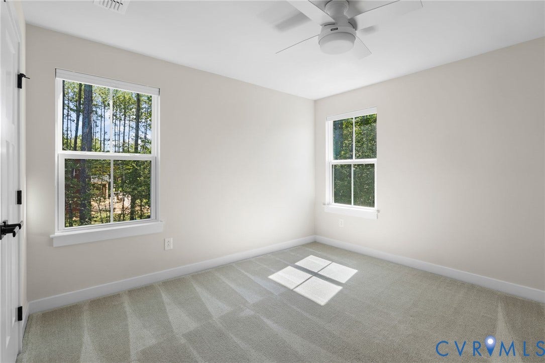8618 McKibben Drive, The Highlands, Chesterfield, VA 23838 Neutral tone walls, ceiling fan, carpeted flooring, and white trim