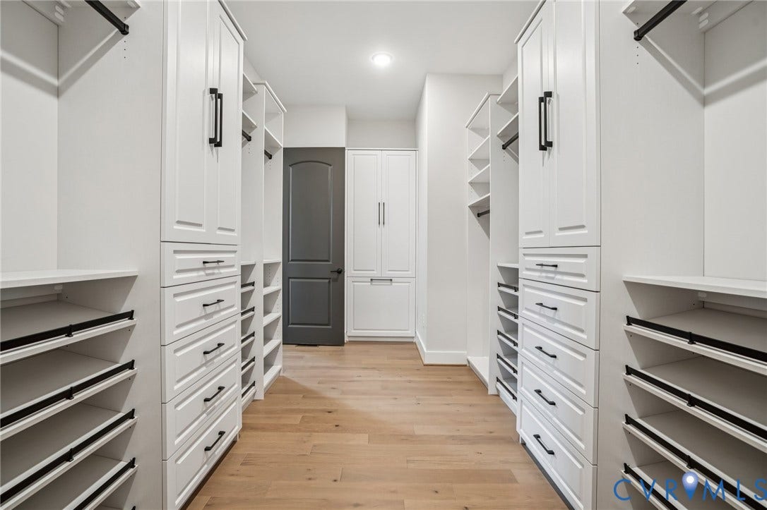 Lot 2 Needlewood Court, Olivet Church Estates, New Kent, VA 23124 White built-in cabinetry, wood-finish flooring, recessed lighting, matte black hardware, and integrated shelving
