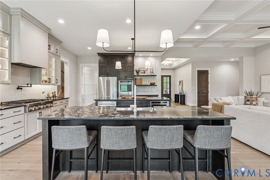 Lot 2 Needlewood Court, Olivet Church Estates, New Kent, VA 23124 Open-concept kitchen with a large island, wood-finish flooring, stainless steel appliances, and a coffered ceiling