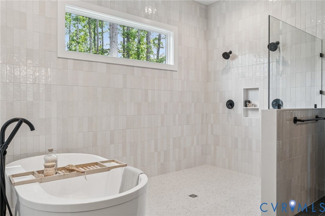 Lot 2 Needlewood Court, Olivet Church Estates, New Kent, VA 23124 Freestanding soaking tub with floor-mounted matte black faucet