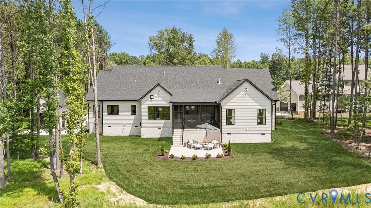 Lot 2 Needlewood Court, Olivet Church Estates, New Kent, VA 23124 White siding exterior with black-framed windows