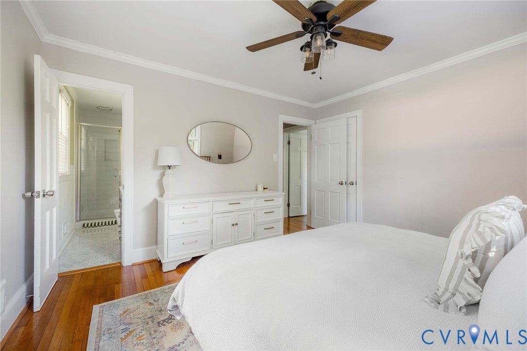 7433 Cherokee Road, Richmond, VA 23225 King-size bed pictured, closet behind door