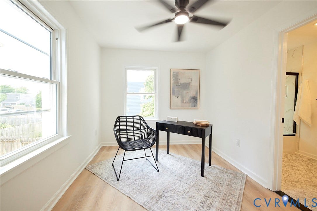3103 Q St, Church Hill, Richmond, VA 23223 Bright room with wood-finish flooring, white walls, and a ceiling fan