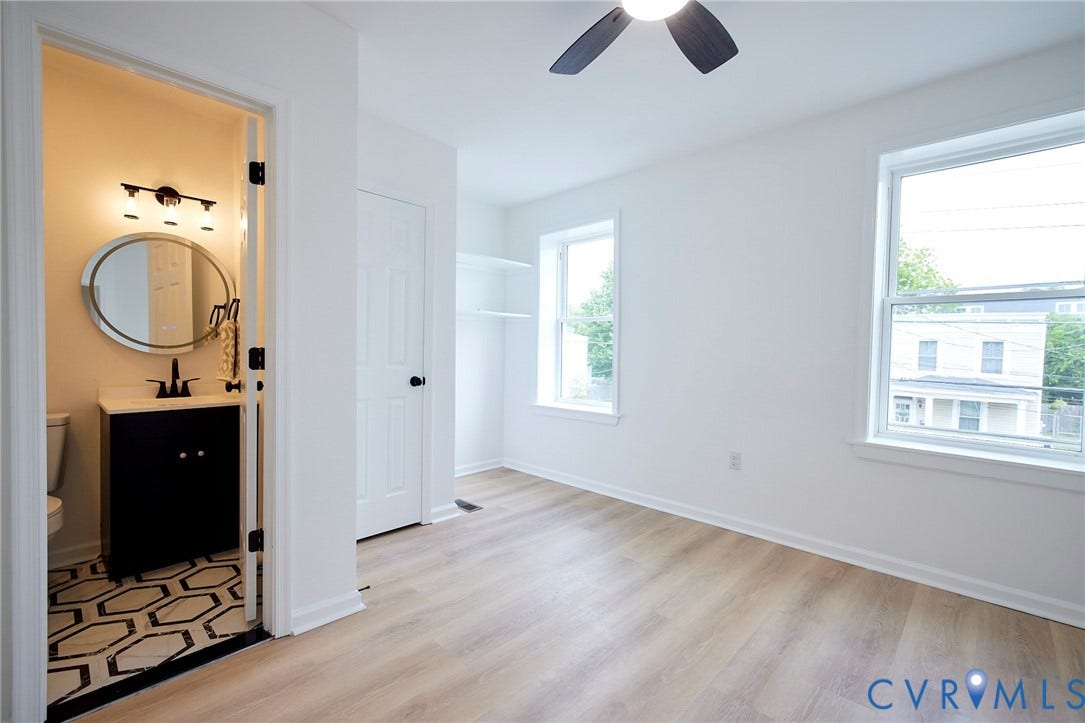 3103 Q St, Church Hill, Richmond, VA 23223 Recessed closet shelving, wood-finish flooring, and multiple windows