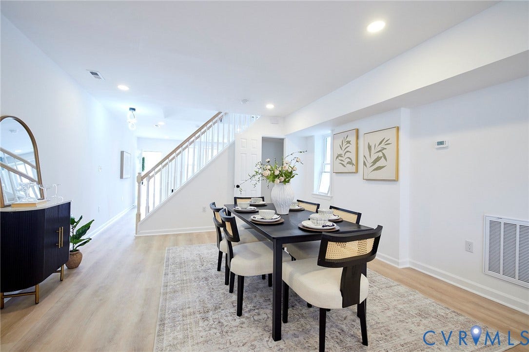 3103 Q St, Church Hill, Richmond, VA 23223 Recessed lighting, wood-finish flooring, white walls, and a staircase with white balusters and a wood handrail