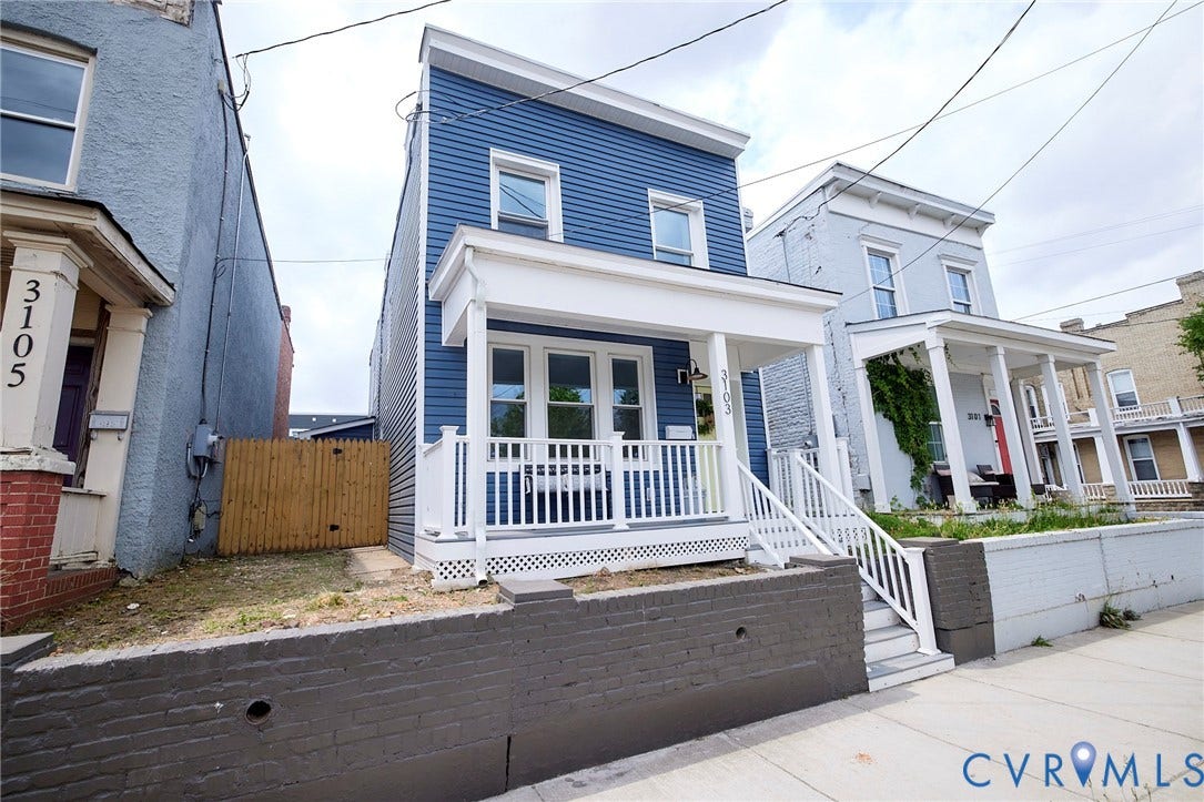 3103 Q St, Church Hill, Richmond, VA 23223 Blue horizontal siding, white trim, and a white front porch with railings