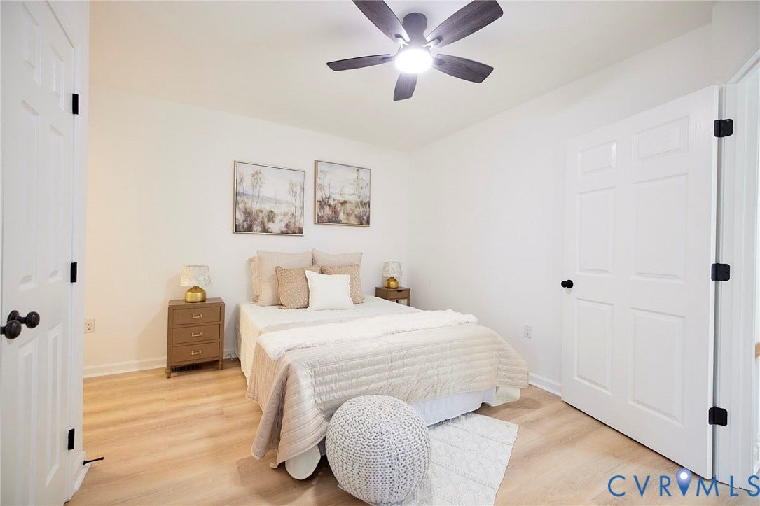 3103 Q St, Church Hill, Richmond, VA 23223 Recessed lighting, wood-finish flooring, white paneled doors, and a ceiling fan with integrated lighting