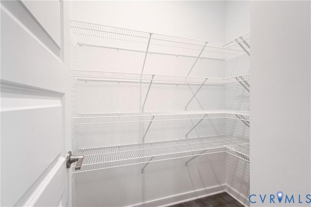 12221 Dutch Elm Circle, Midlothian, VA 23112 Walk-in pantry with multiple levels of wire shelving and wood-finish flooring