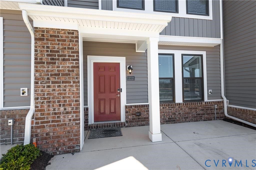 12221 Dutch Elm Circle, Midlothian, VA 23112 Covered entry with brick and siding exterior