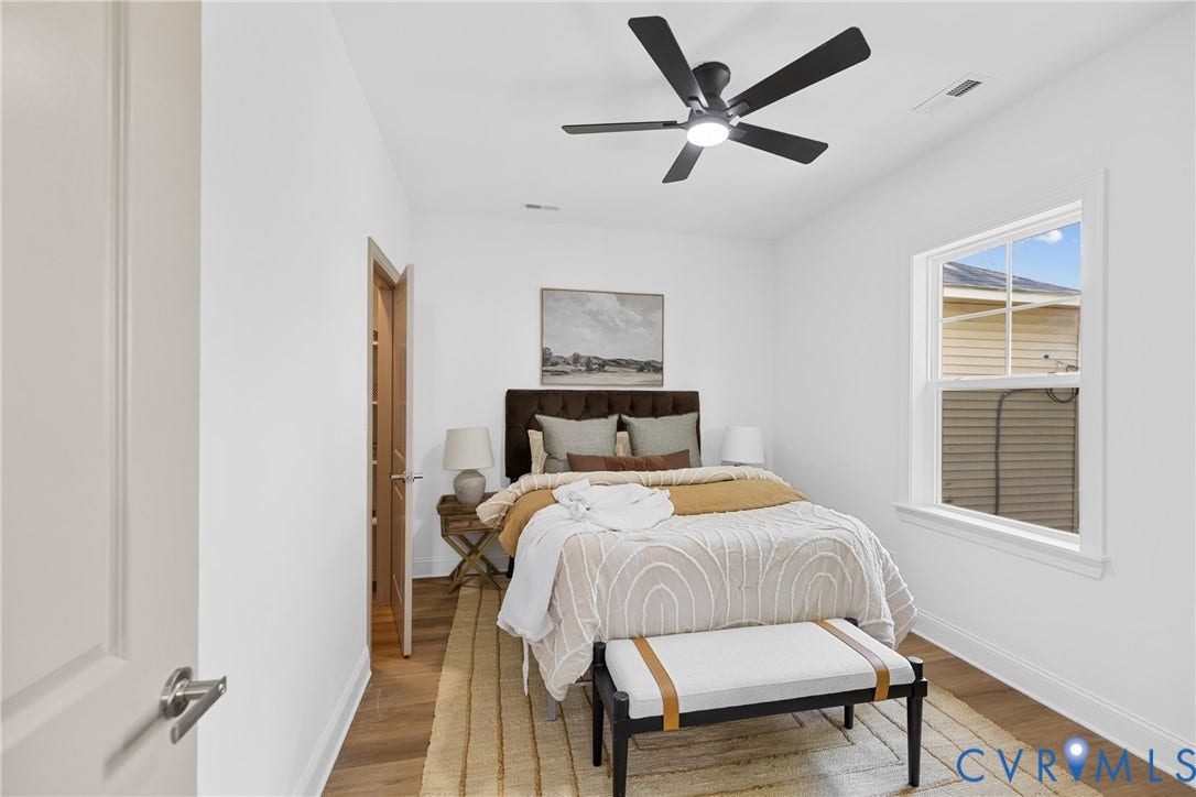 Recessed lighting, wood-finish flooring, white walls, and a ceiling fan