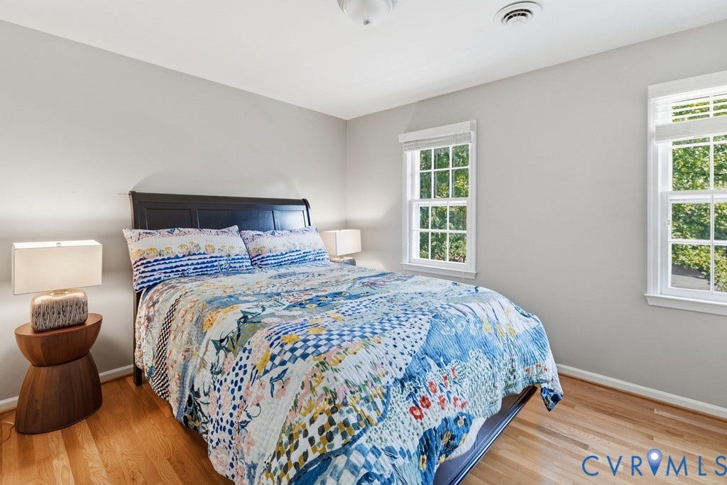 2416 Mountainbrook Drive, Crown Grant, Henrico, VA 23233 Hardwood flooring, two double-hung windows, and a dark wood-finish headboard