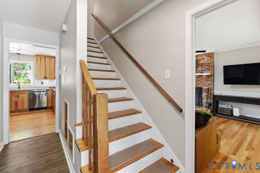 2416 Mountainbrook Drive, Crown Grant, Henrico, VA 23233 Hardwood staircase with natural wood handrails, front to back view