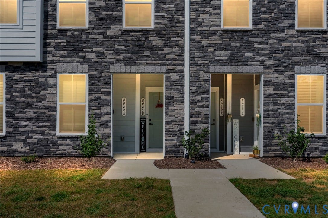 8045 Lake Laurel Lane, #B, Laurel Oak Condos, Glen Allen, VA 23060 Stone-clad exterior with multiple windows and light-colored siding accents