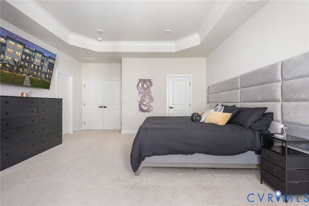 8045 Lake Laurel Lane, #B, Laurel Oak Condos, Glen Allen, VA 23060 Recessed lighting, tray ceiling, carpet flooring, and white paneled doors