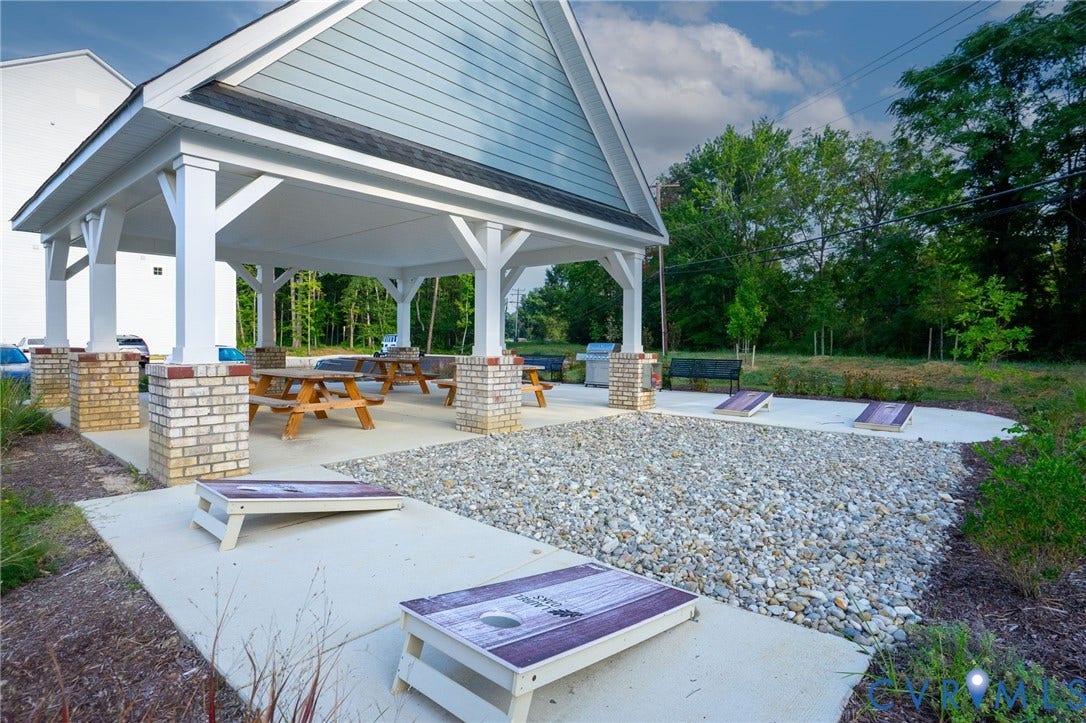 8045 Lake Laurel Lane, #B, Laurel Oak Condos, Glen Allen, VA 23060 Outdoor pavilion with brick and column supports, featuring a concrete pad and gravel area