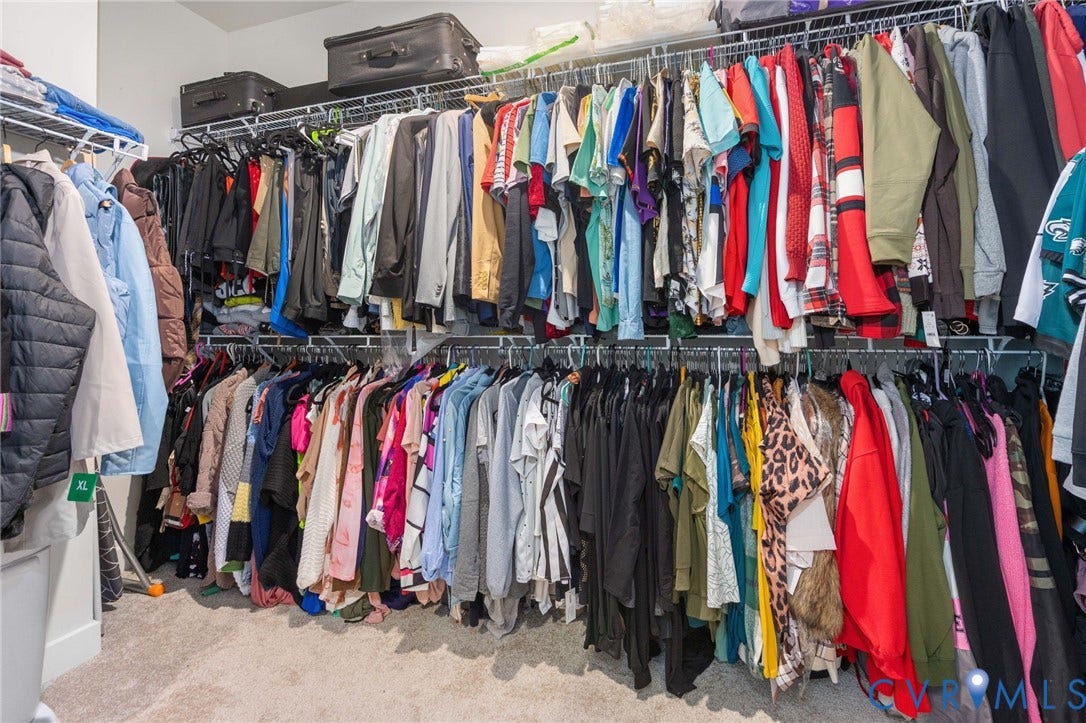 8045 Lake Laurel Lane, #B, Laurel Oak Condos, Glen Allen, VA 23060 Custom closet system featuring multiple hanging rods and integrated shelving