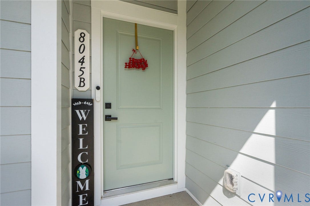 8045 Lake Laurel Lane, #B, Laurel Oak Condos, Glen Allen, VA 23060 Light-toned horizontal siding with a contrasting white trim
