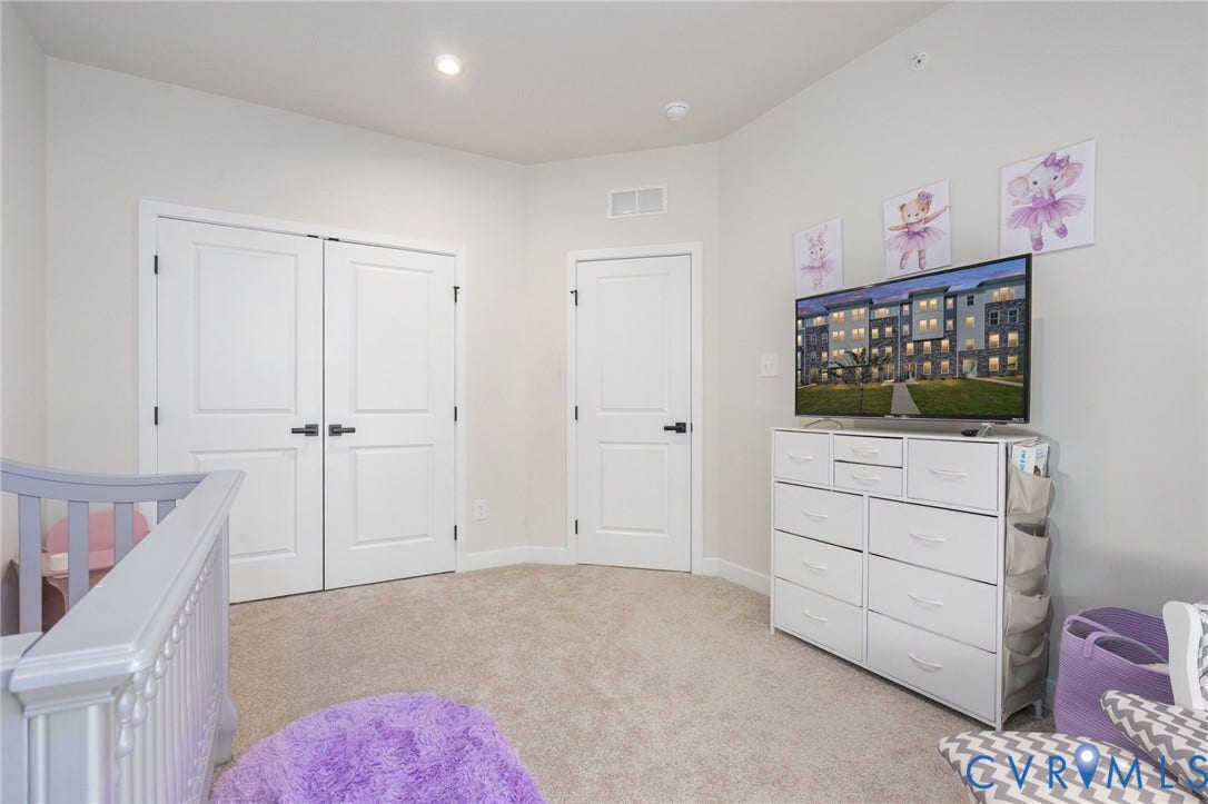 8045 Lake Laurel Lane, #B, Laurel Oak Condos, Glen Allen, VA 23060 Recessed ceiling lighting, light-toned carpeting, white walls, and a white two-panel double door
