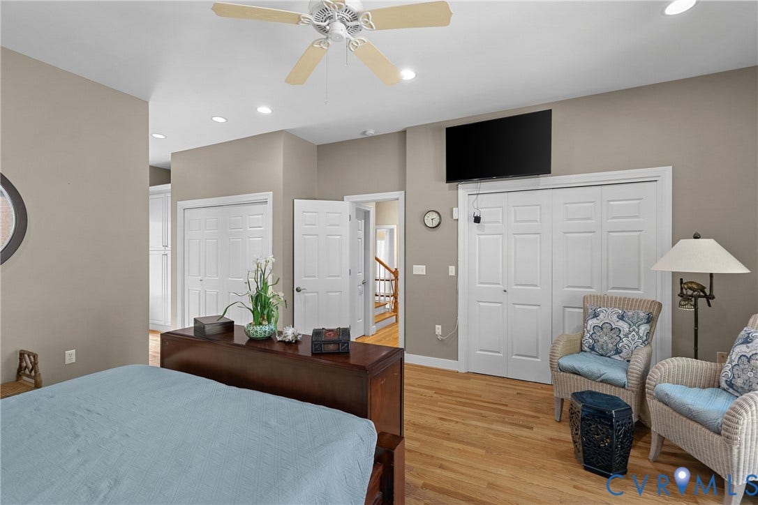 447 Tranquility Road, Reedville, VA 22539 Hardwood flooring, recessed lighting, ceiling fan, bi-fold closet doors, and a wall-mounted television