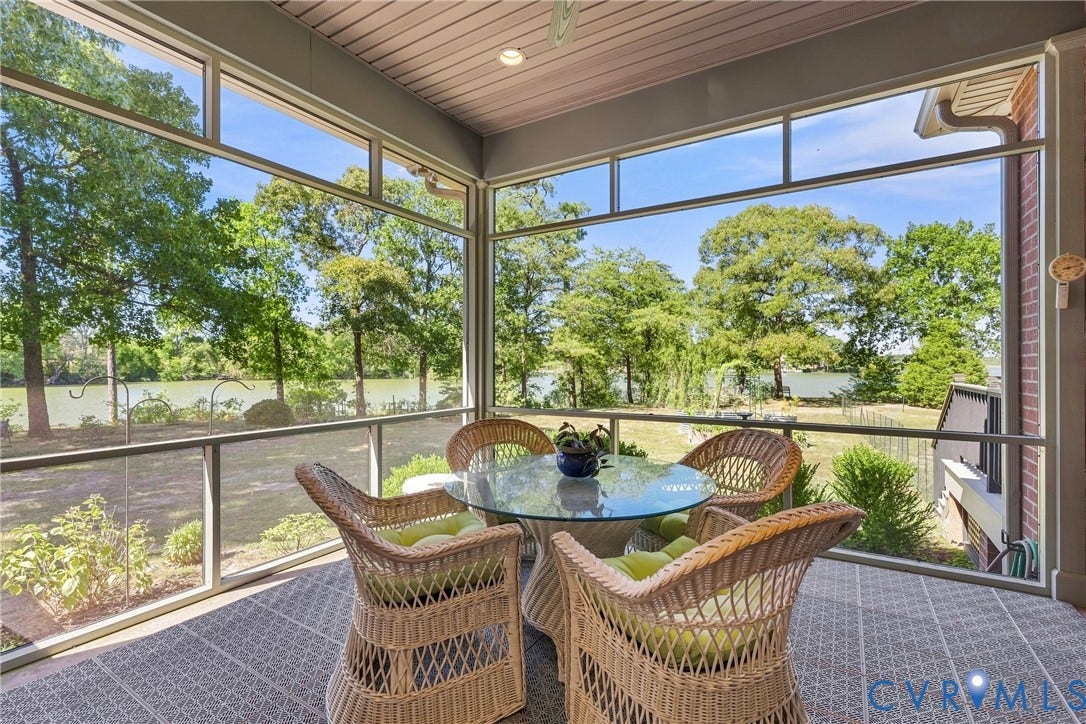 447 Tranquility Road, Reedville, VA 22539 Screened porch with tiled flooring, integrated ceiling lighting, and expansive water frontage