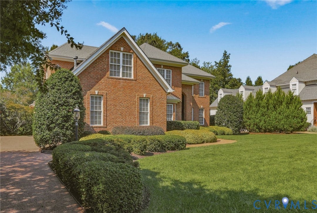 3012 Hedgeway Place, Tarrington, Midlothian, VA 23113 Brick exterior with a gabled roofline, mature trees, and manicured landscaping
