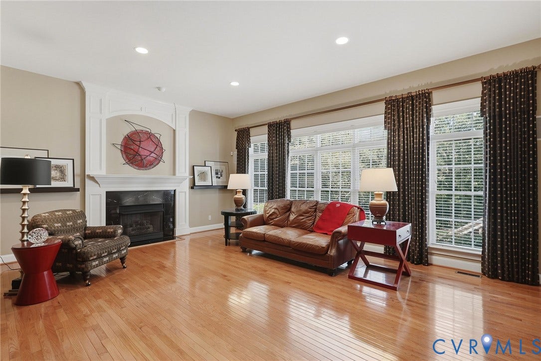3012 Hedgeway Place, Tarrington, Midlothian, VA 23113 Spacious room featuring wood-finish flooring, recessed lighting, and a fireplace with an ornate white mantel