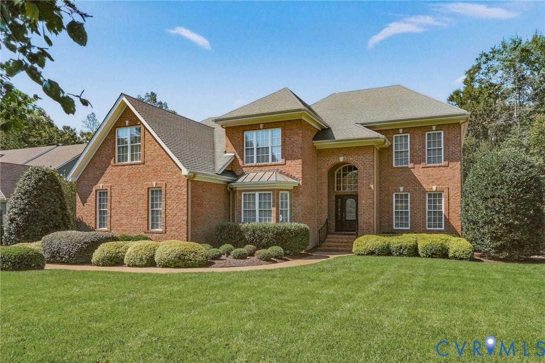 3012 Hedgeway Place, Tarrington, Midlothian, VA 23113 Brick exterior with multiple gables, arched entry, bay window, and mature landscaping