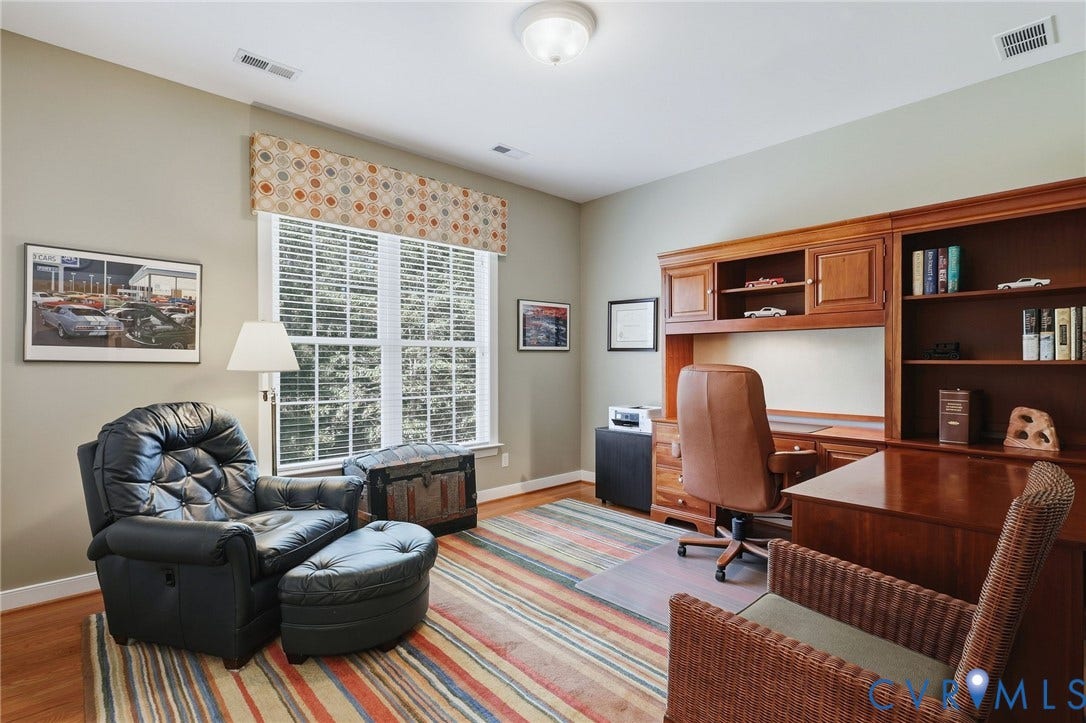 3012 Hedgeway Place, Tarrington, Midlothian, VA 23113 Built-in wood cabinetry and shelving, wood-finish flooring, and a multi-pane window with blinds