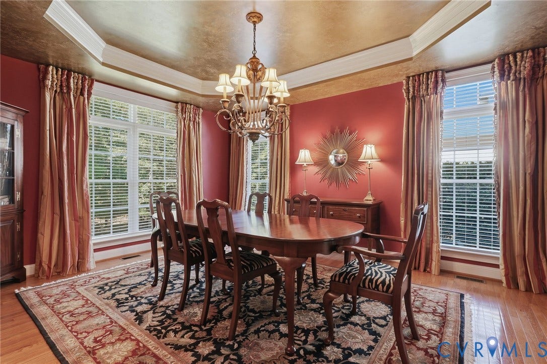 3012 Hedgeway Place, Tarrington, Midlothian, VA 23113 Dining area featuring wood-finish flooring, a tray ceiling, and a chandelier