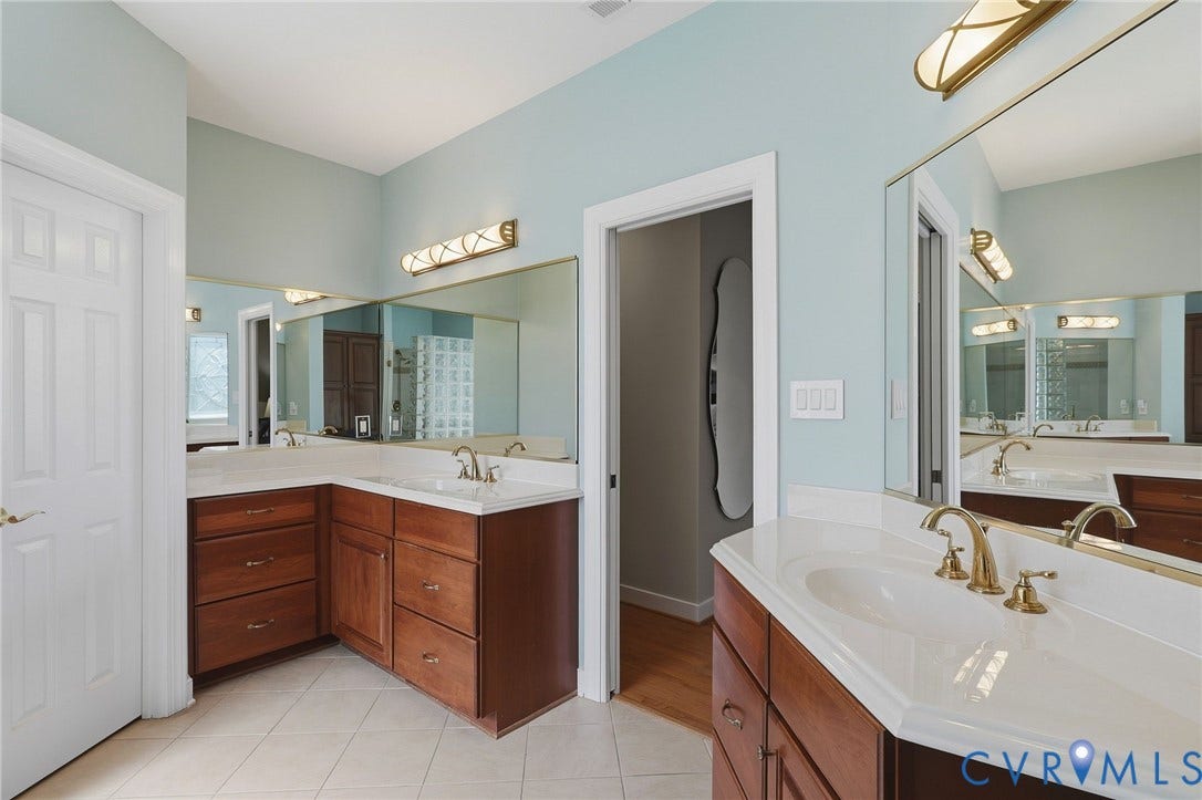 3012 Hedgeway Place, Tarrington, Midlothian, VA 23113 Double vanity featuring wood cabinetry and white countertops
