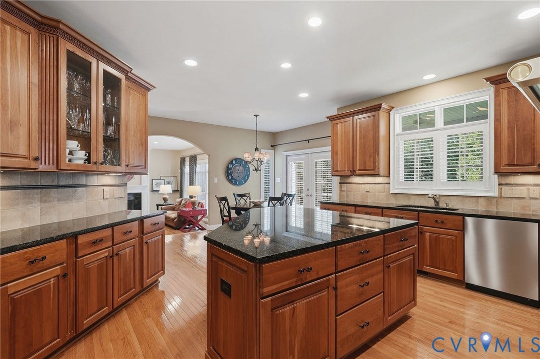 3012 Hedgeway Place, Tarrington, Midlothian, VA 23113 Kitchen featuring wood-finish cabinetry, dark countertops, hardwood flooring, and recessed lighting