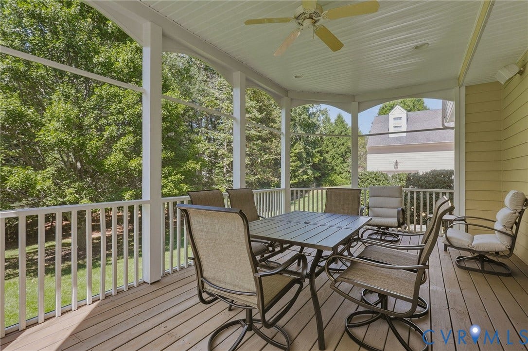 3012 Hedgeway Place, Tarrington, Midlothian, VA 23113 Screened porch featuring wood-finish flooring, white railing, ceiling fan, and exterior siding