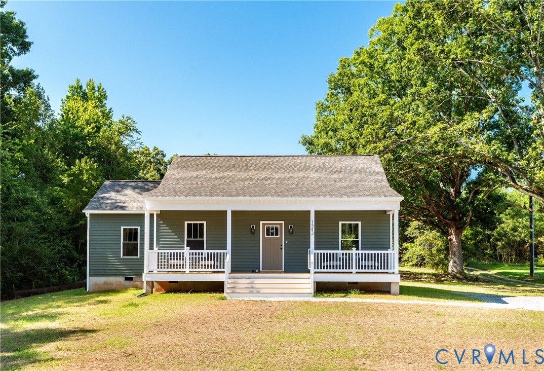 1343 Stokes Station Road, Goochland, VA 23063 Ranch-style residence featuring a covered front porch, white railings, a shingle roof, and dark siding