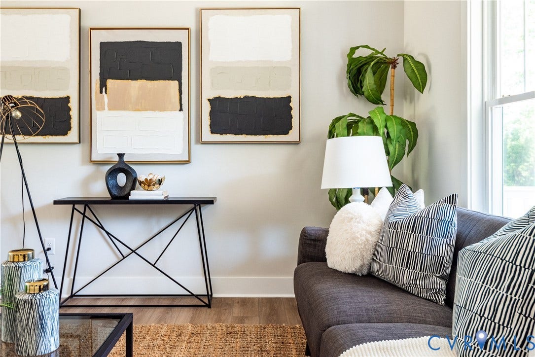 1343 Stokes Station Road, Goochland, VA 23063 Wall-mounted artwork, black console table with geometric base