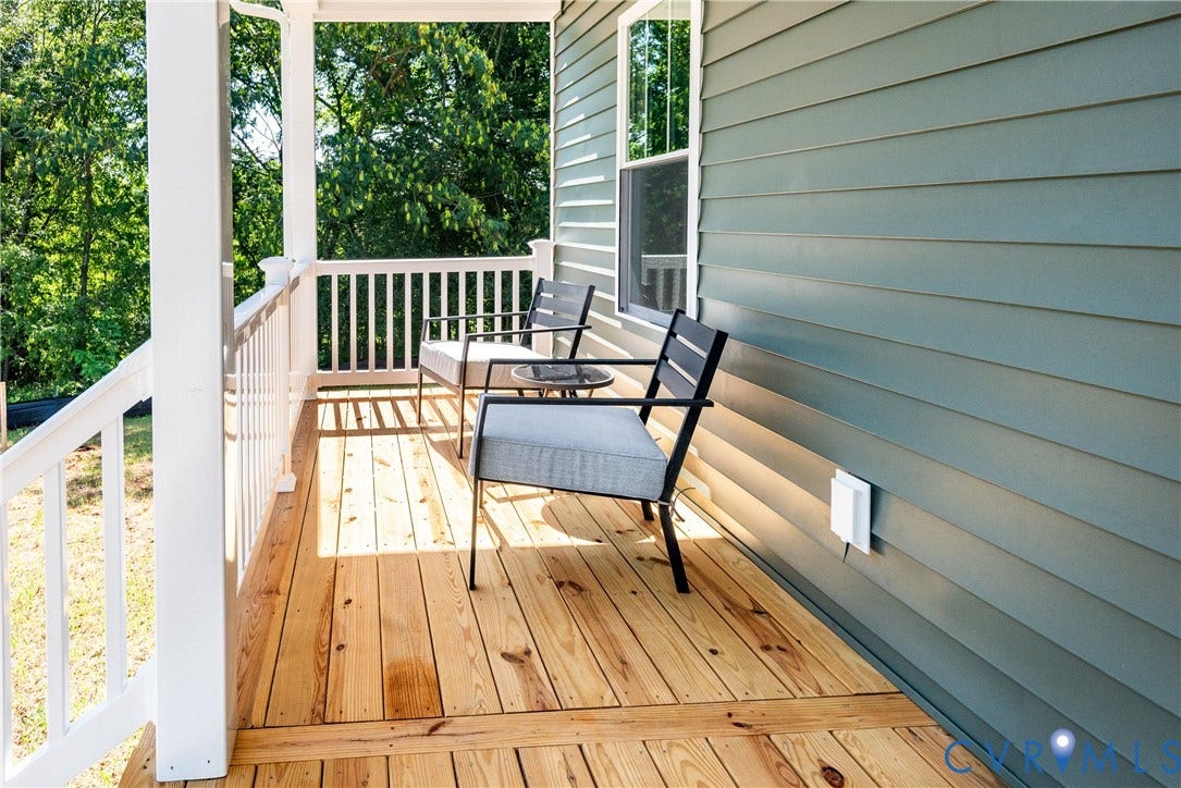 1343 Stokes Station Road, Goochland, VA 23063 Front porch with wood-finish decking, white railings, and siding exterior