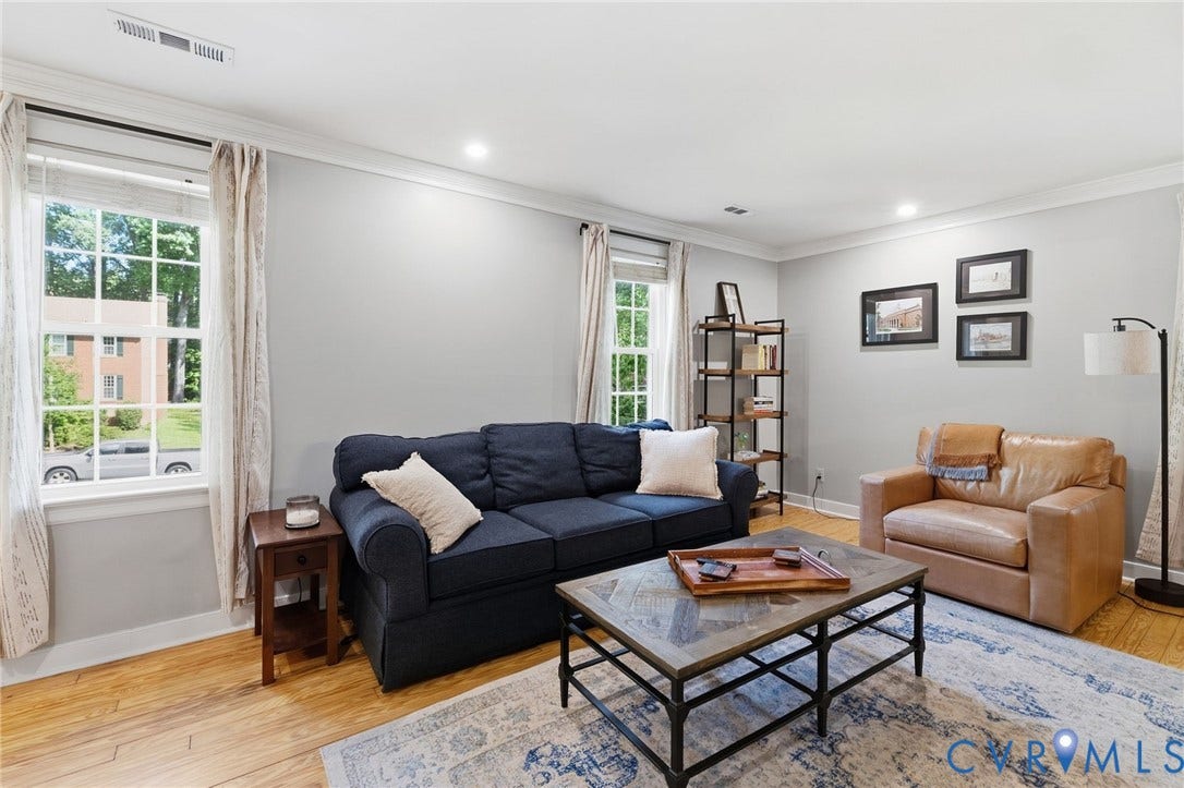 10407 Silverbrook Drive, Henrico, VA 23233 Hardwood flooring, recessed lighting, crown molding, white trim, and a window with divided lites